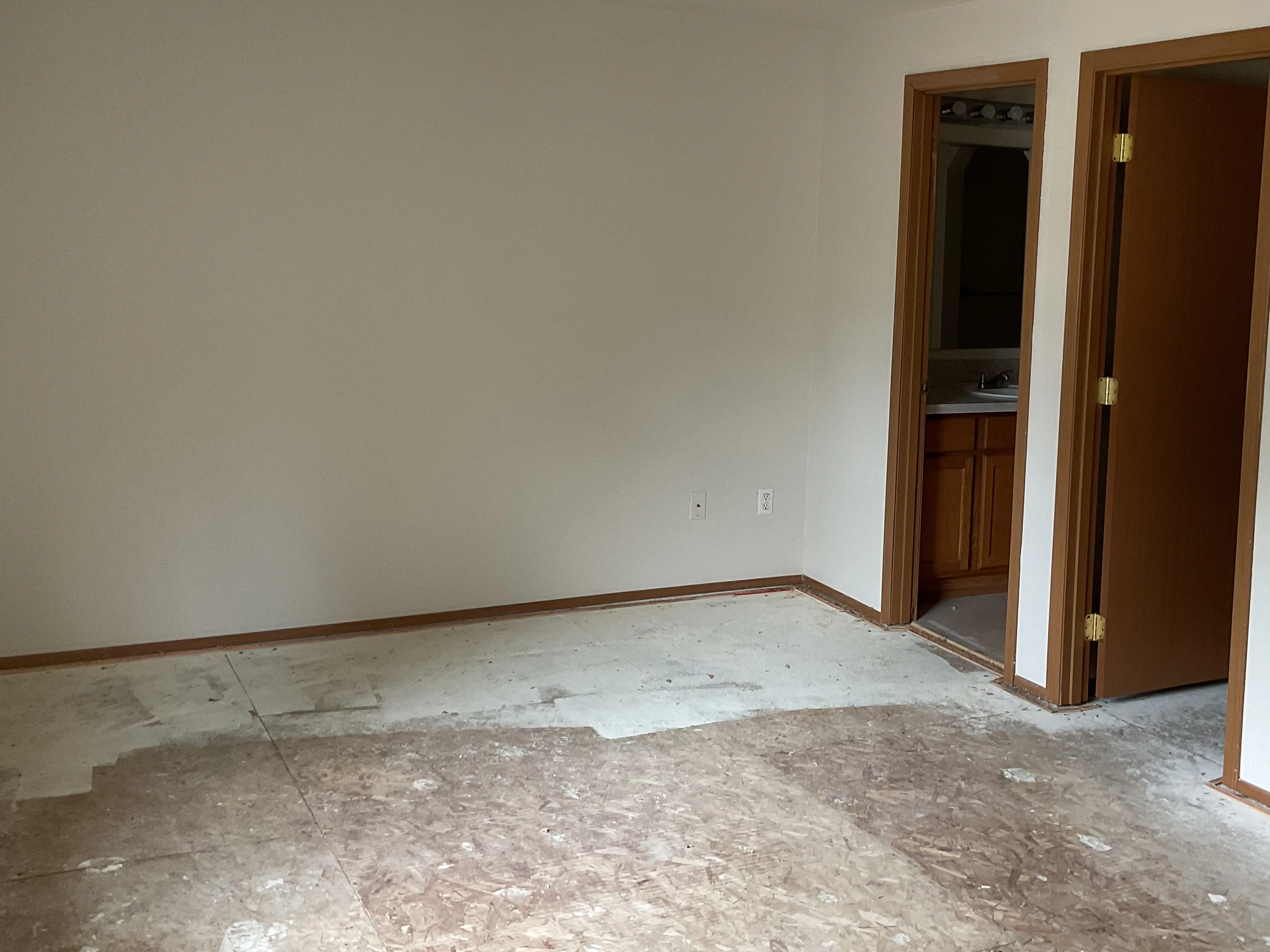 Old damaged interior flooring before professional renovation in Lacey Washington